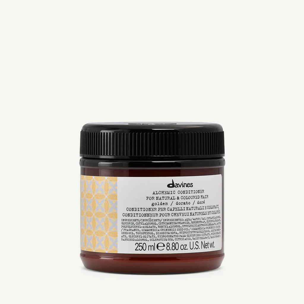 Burk med Alchemic Conditioner Golden balsam för naturligt och färgat hår, miljövänlig hårvårdsprodukt i 250 ml från Davines.