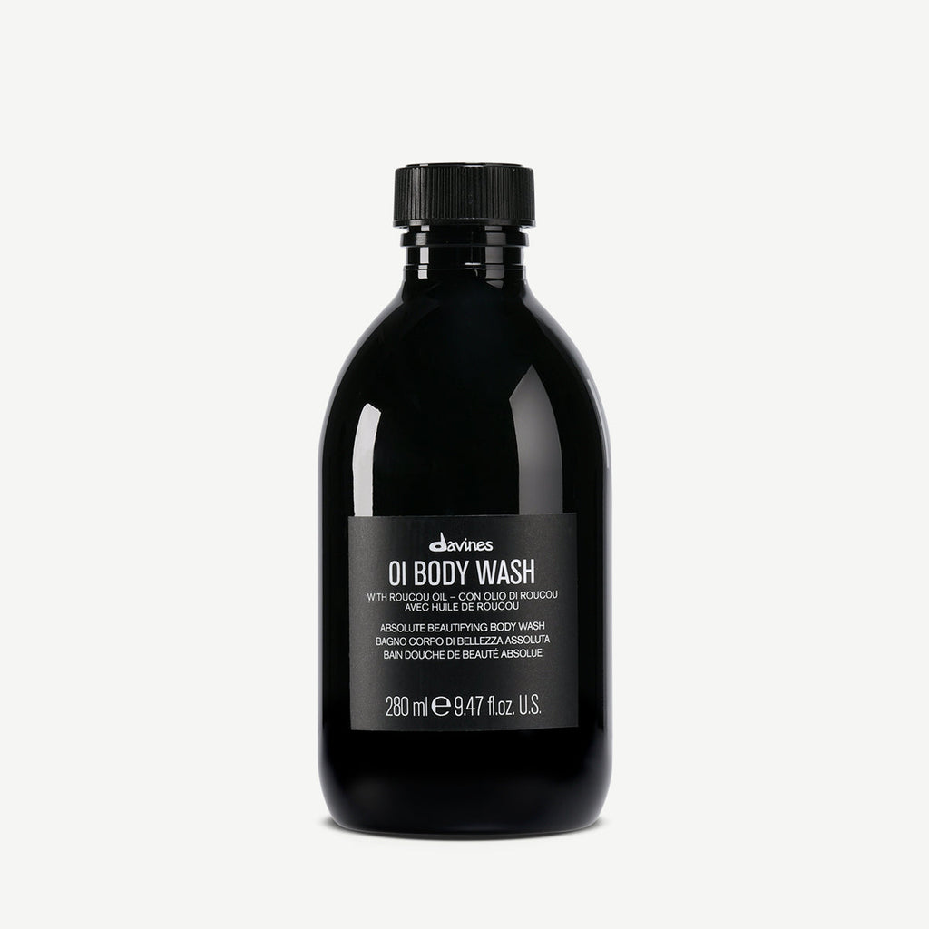 Svart flaska med Davines OI/Body Wash, en mild och vårdande kroppstvål i en återvinningsbar förpackning på 280 ml.