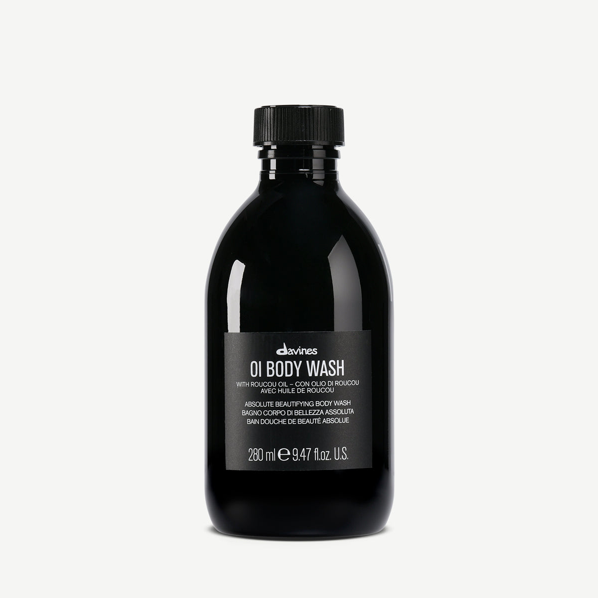 Svart flaska med Davines OI/Body Wash, en mild och vårdande kroppstvål i en återvinningsbar förpackning på 280 ml.