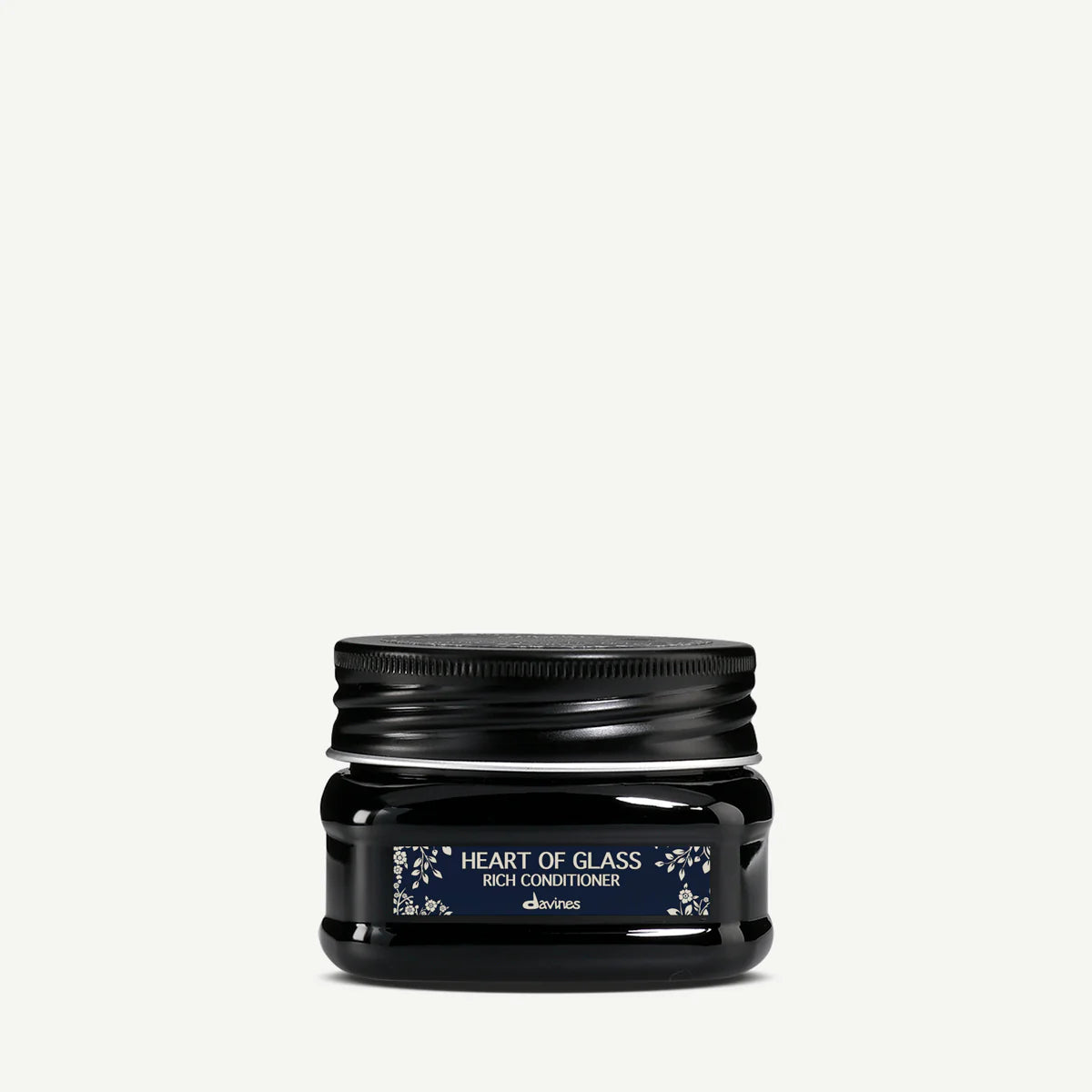 Heart of Glass Rich Conditioner i svart burk med skruvlock, en rik balsam för intensiv vård av håret från Davines.