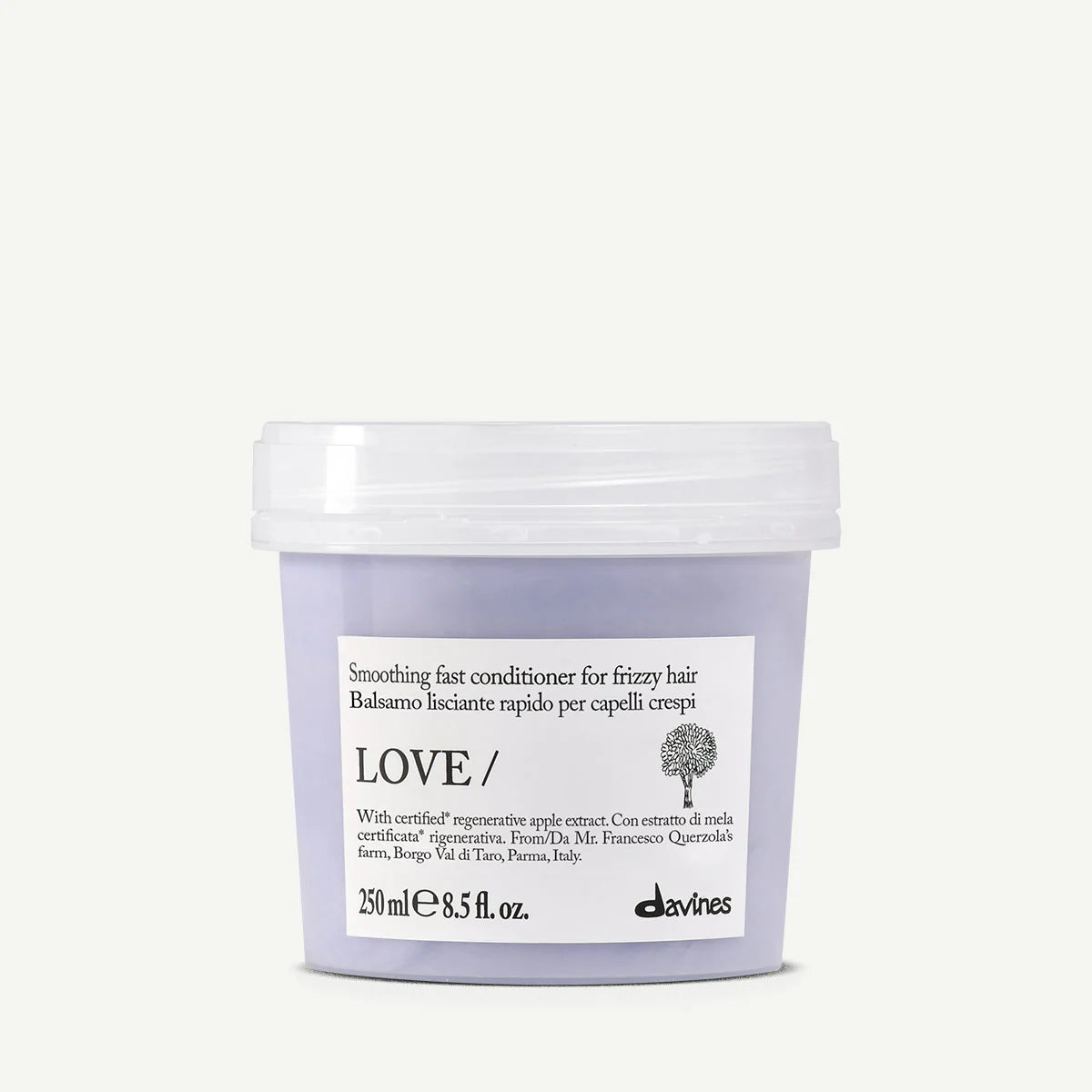 Love Smoothing Fast Conditioner i en lila burk, ett miljövänligt balsam som ger snabb utjämning för frissigt hår.