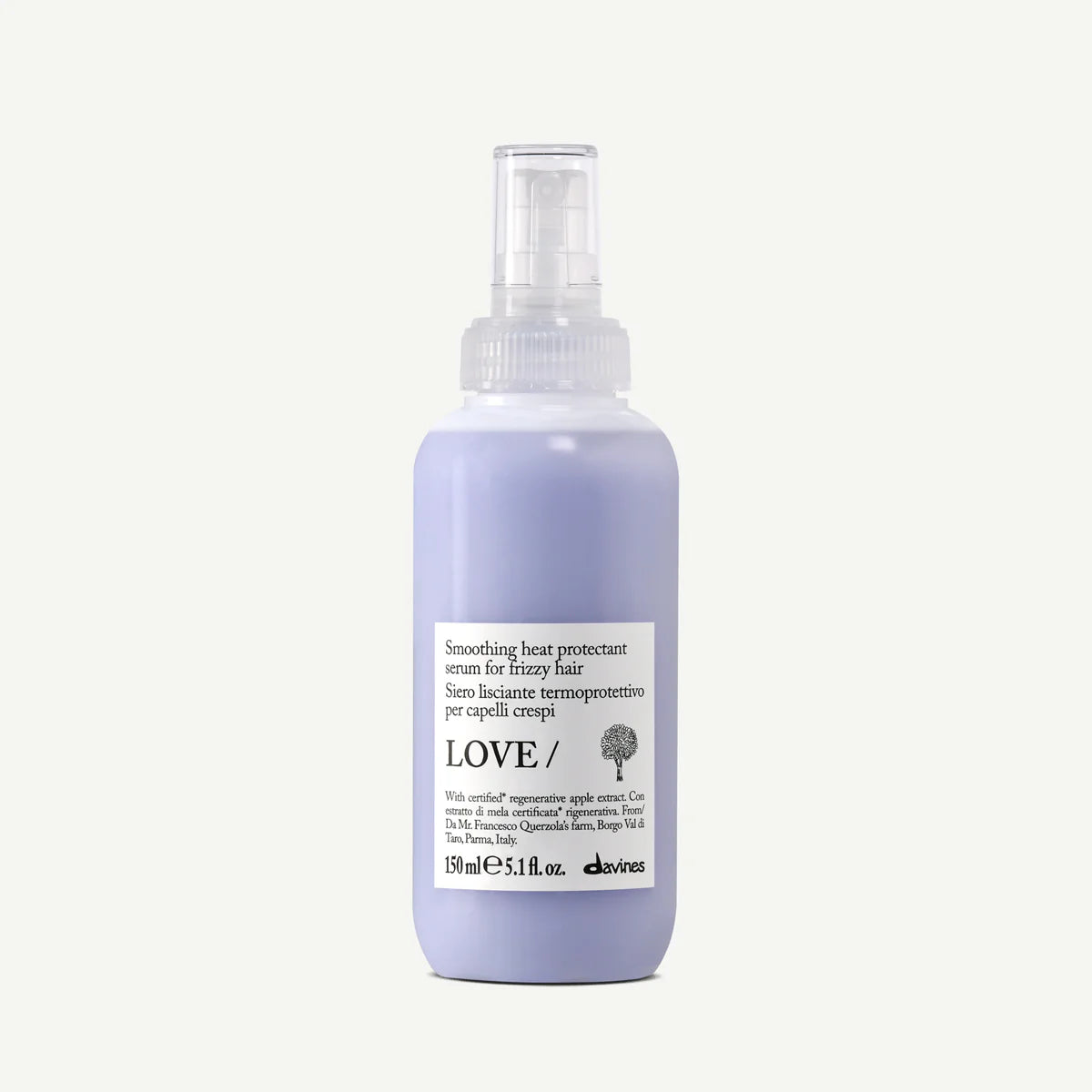 Flaska med Love Smoothing Heat Protectant Serum i lila förpackning, värmeskyddande stylingprodukt som hjälper till att jämna ut och skydda håret vid användning av värmeverktyg.