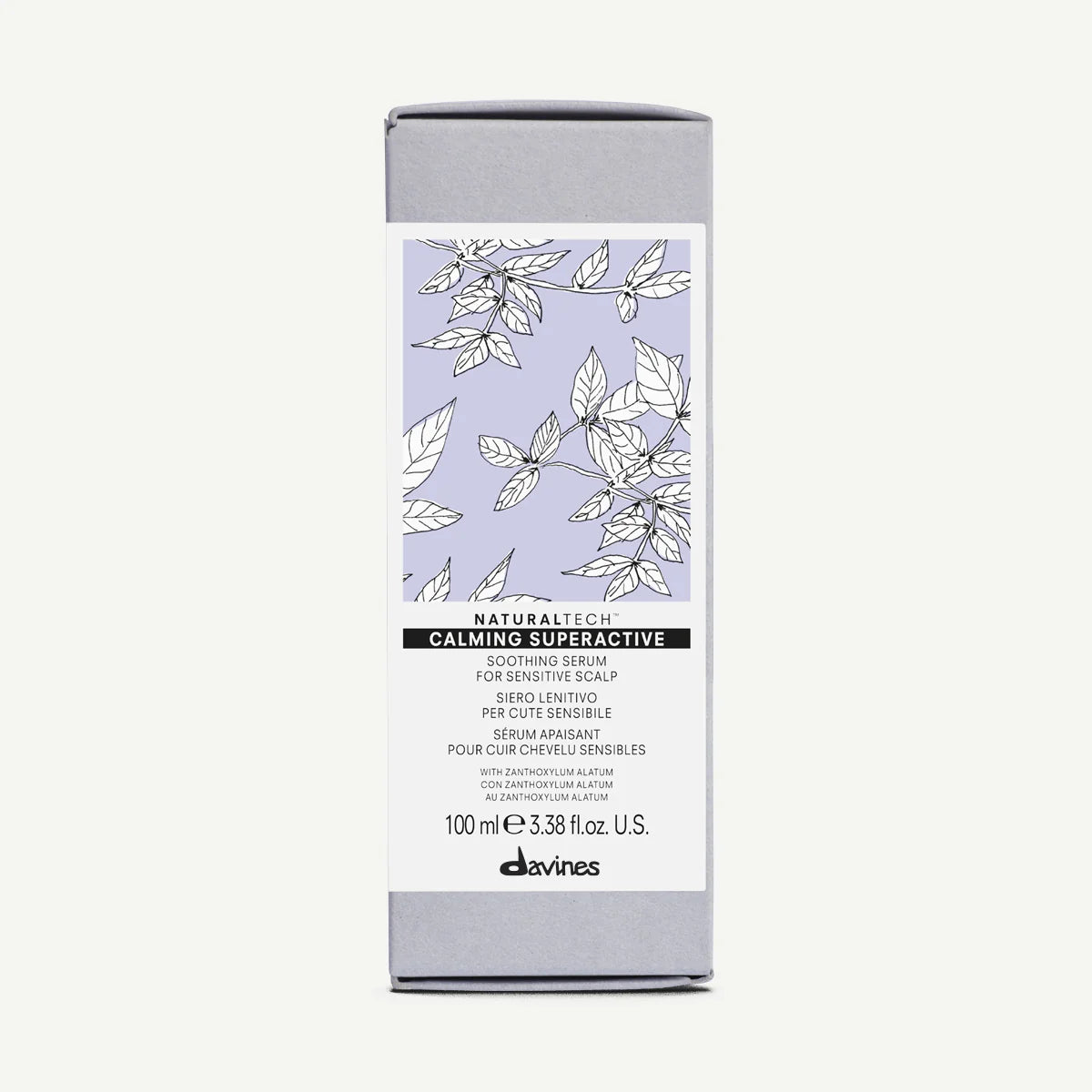 Förpackning av Naturaltech Calming Superactive från Davines, en lugnande hårvårdsprodukt i serumform för känslig hårbotten, miljövänlig och skonsam.