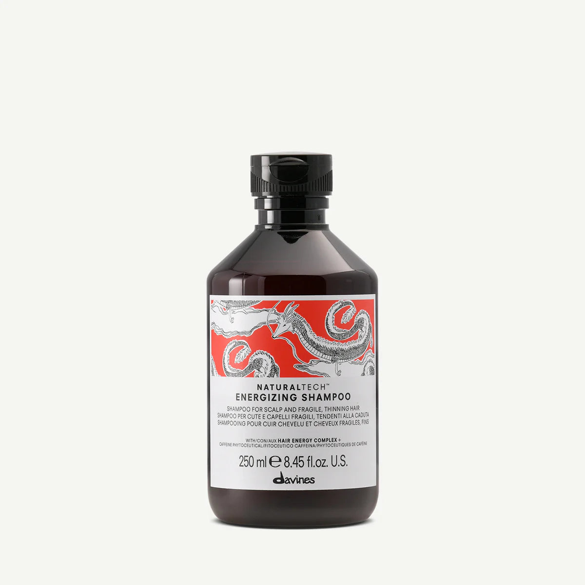 Flaska med Naturaltech Energizing Shampoo från Davines, ett milt och miljövänligt schampo som stärker och energigivande för tunt och skört hår.