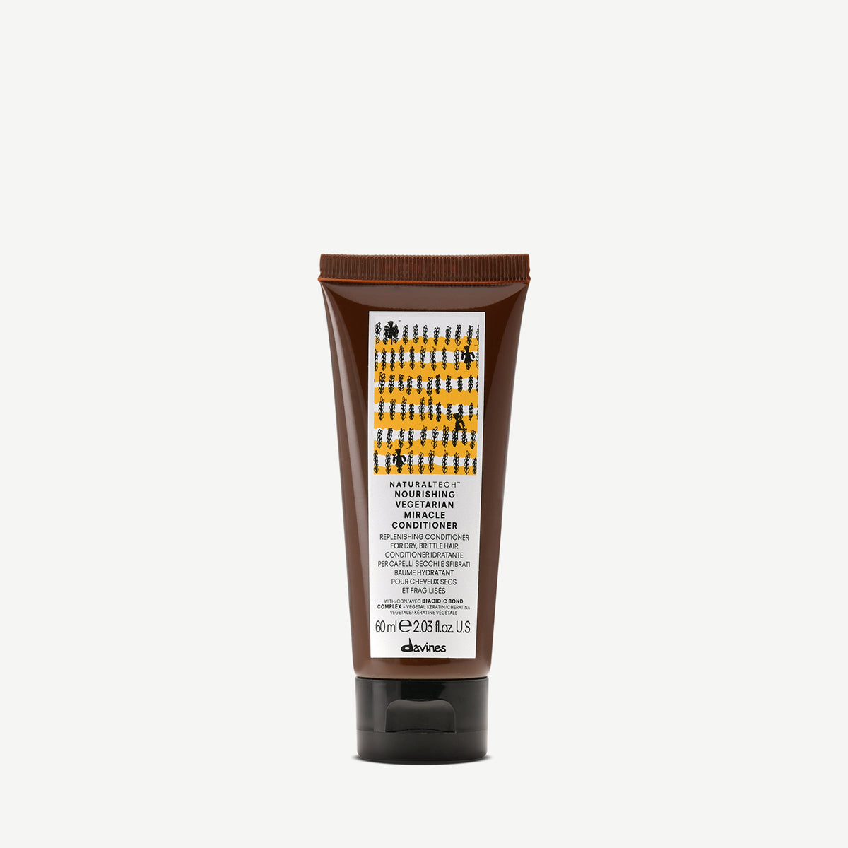 Naturaltech Nourishing Miracle Conditioner i en brun tub, ett milövänligt balsam som ger vård och näring till torrt och skadat hår.
