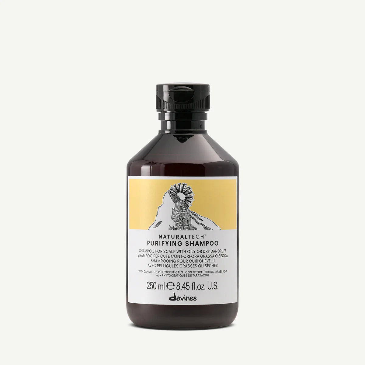 Flaska med Naturaltech Purifying Shampoo från Davines, designad för att rengöra hårbotten och behandla torr eller fet mjäll, i en brun flaska med gul etikett.