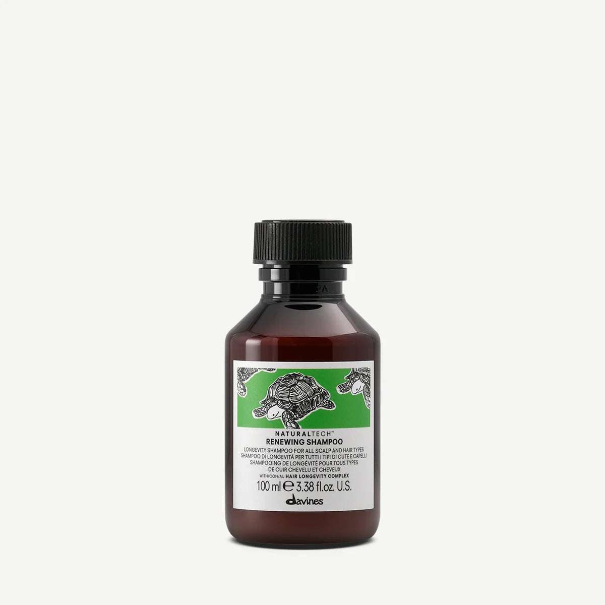 Naturaltech Renewing Shampoo i en liten brun flaska med svart lock, mild schampo för hårbotten och hår, miljövänliga hårvårdsprodukter från Davines.