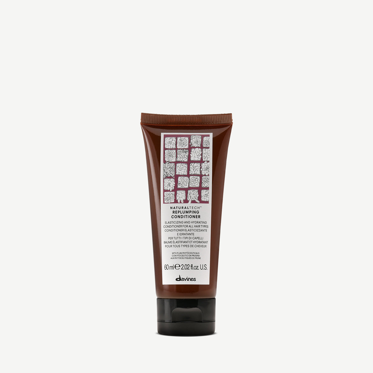 Naturaltech Replumping Conditioner i en brun tub fördjupar och återfuktar håret, idealisk som balsam för en naturlig och återfuktande hårvårdsrutin.
