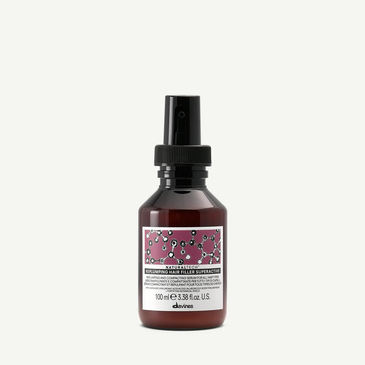 Naturaltech Replumping Hair Filler i brun sprayflaska från Davines, en miljövänlig hårvårdsprodukt som ger fyllighet och vård till slitet hår.