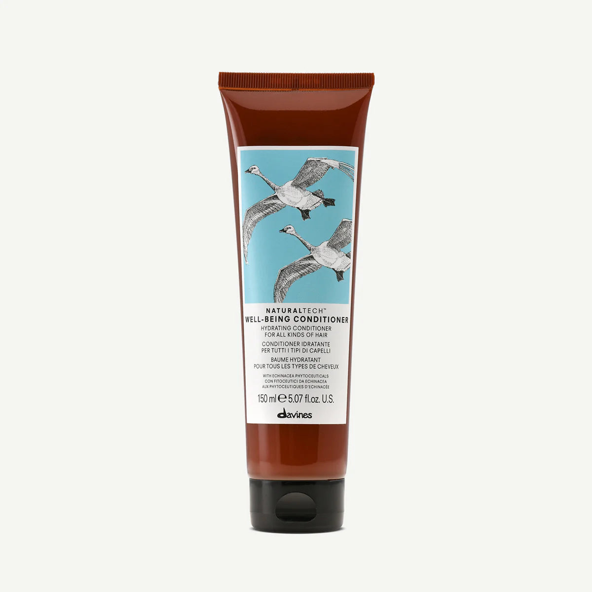 Naturaltech Well-Being Conditioner i brun tub med motiv av flygande fåglar, balsam för alla hårtyper som återfuktar och vårdar håret milt och effektivt.