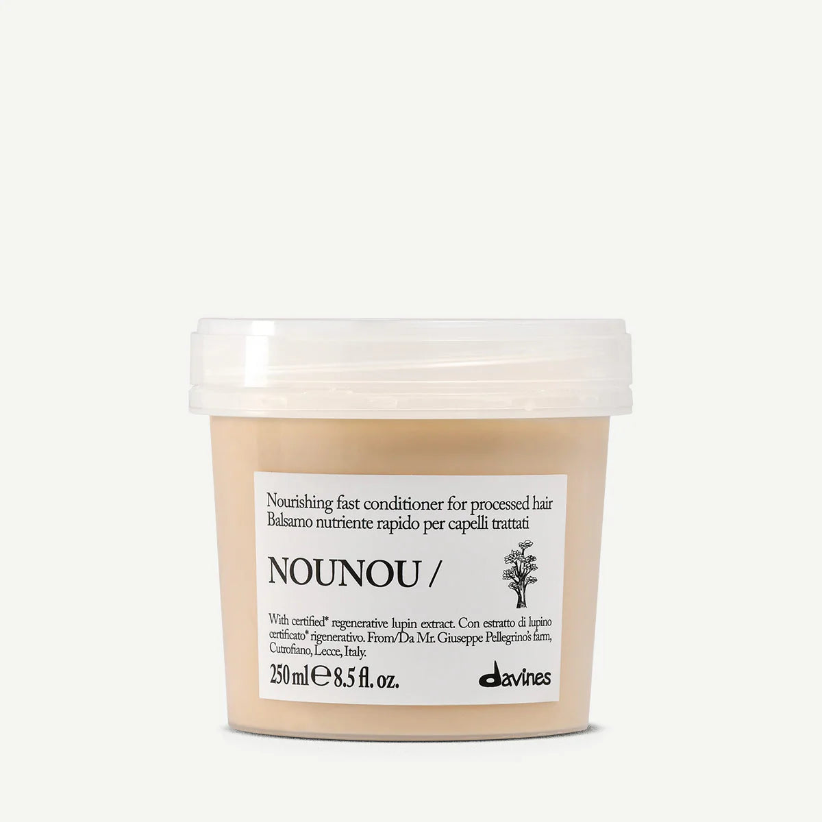 Nounou Nourishing Fast Conditioner i beige burk med vit lock, ett balsam för skadat och behandlat hår från Davines med närande och regenererande egenskaper.
