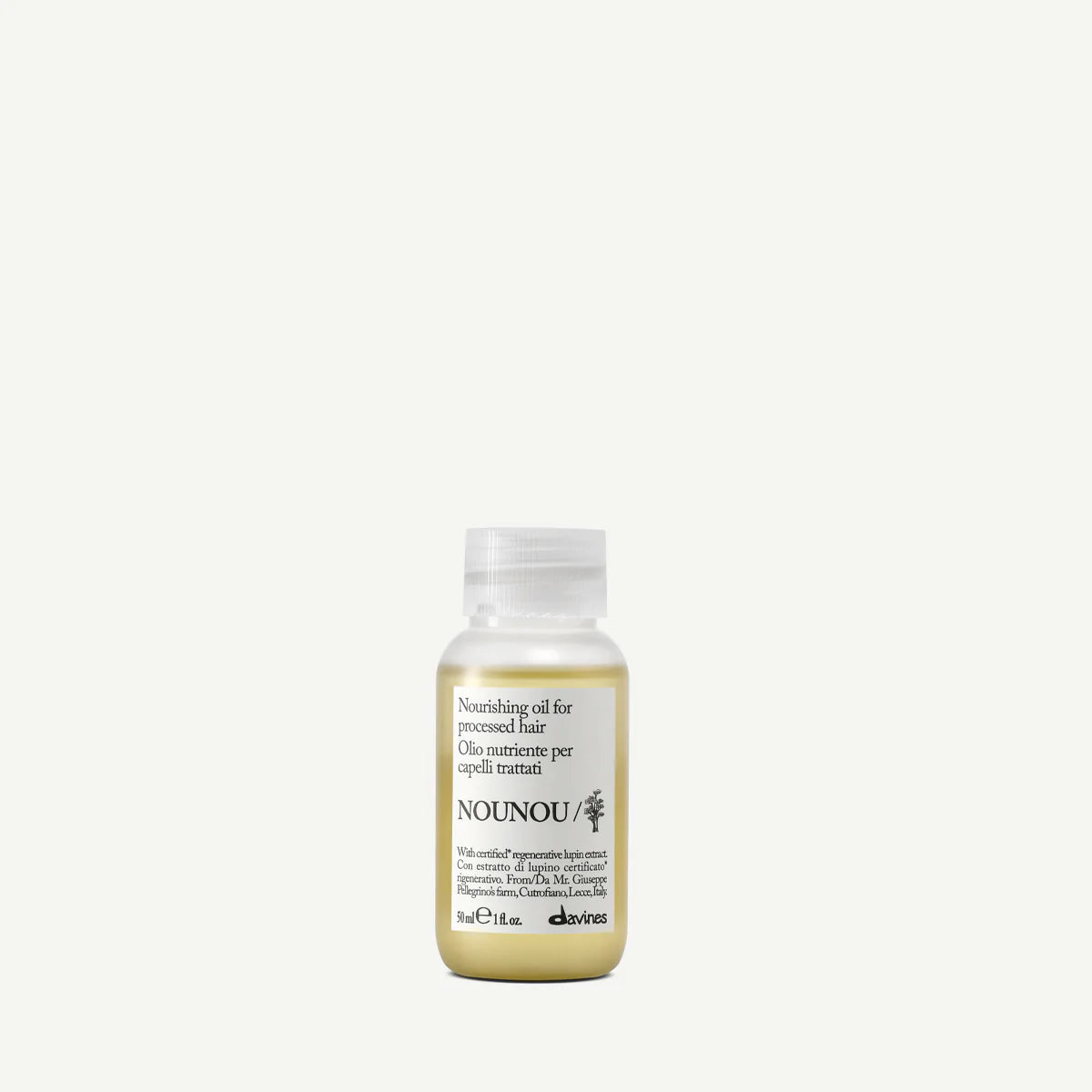 Nounou Nourishing Oil i en liten flaska, en närande olja för behandlat hår som ger mjukhet och glans med miljövänliga ingredienser.