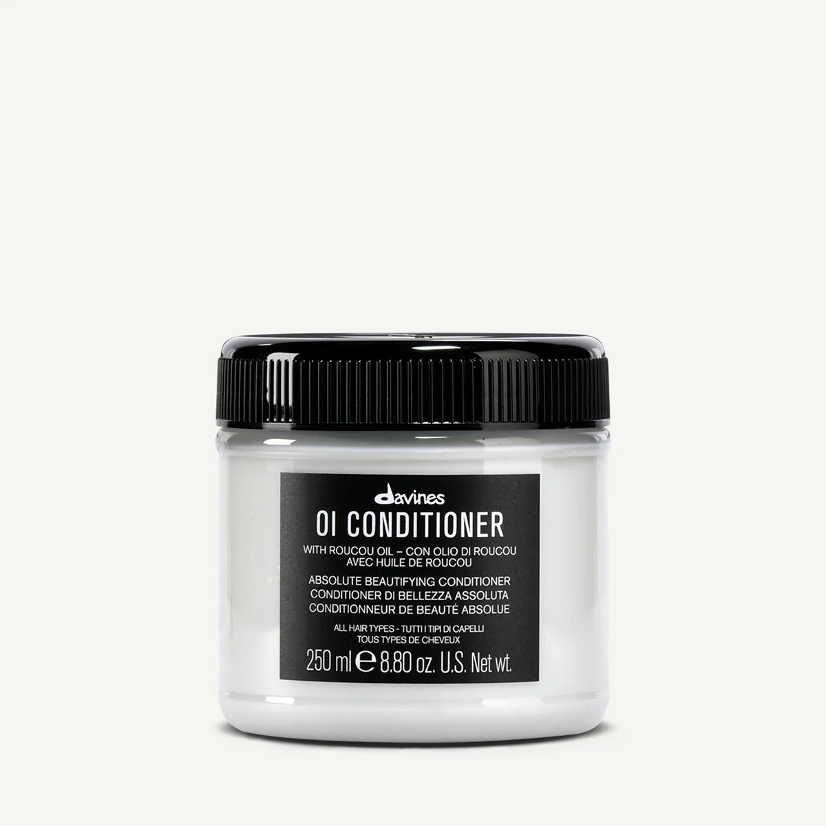 Burk med OI/Conditioner balsam från Davines innehållande roucou-olja, 250 ml, för vård och återfuktning av alla hårtyper.