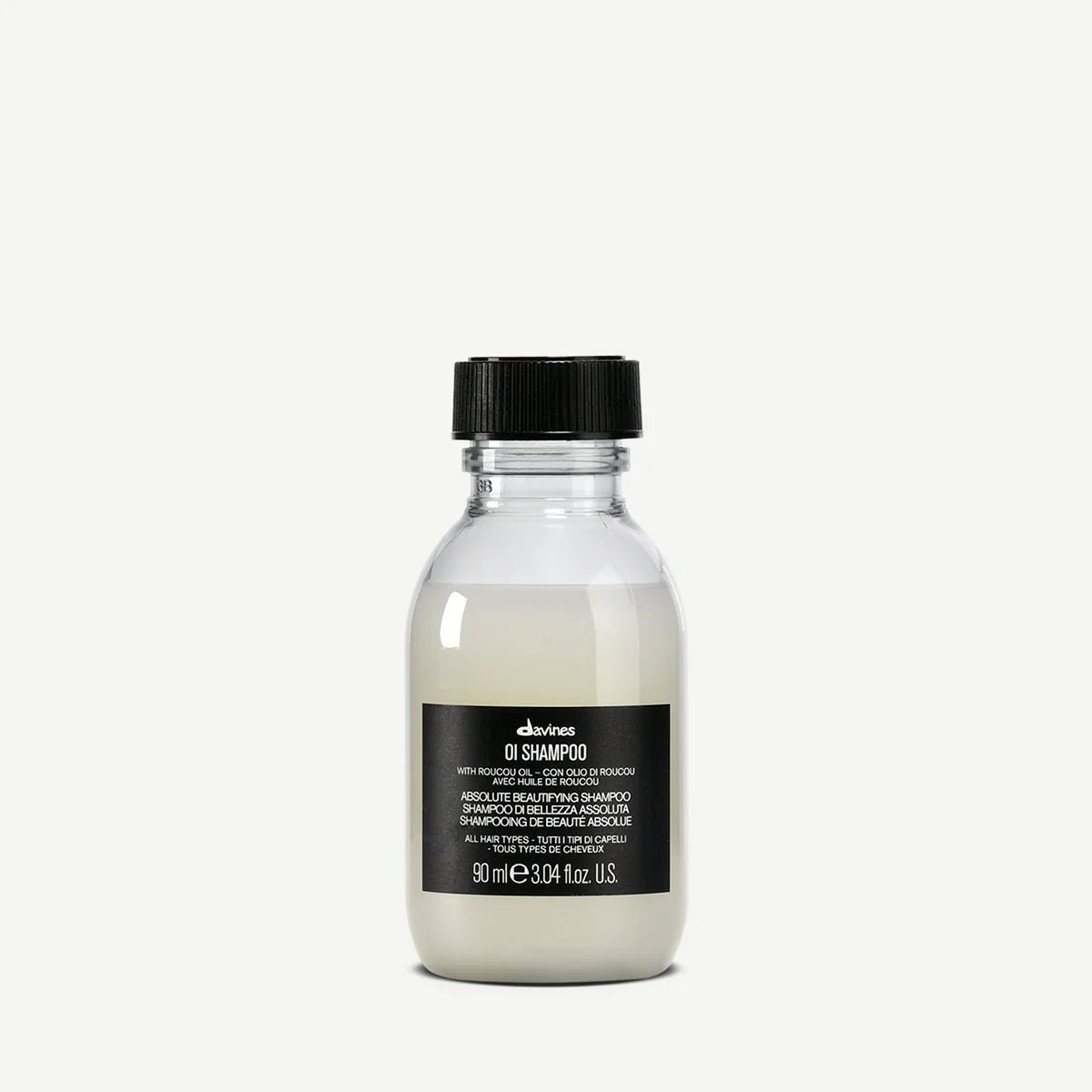 Flaska med OI/Shampoo från Davines, ett milt och vårdande schampo som passar alla hårtyper och ger glans samt återfuktning.