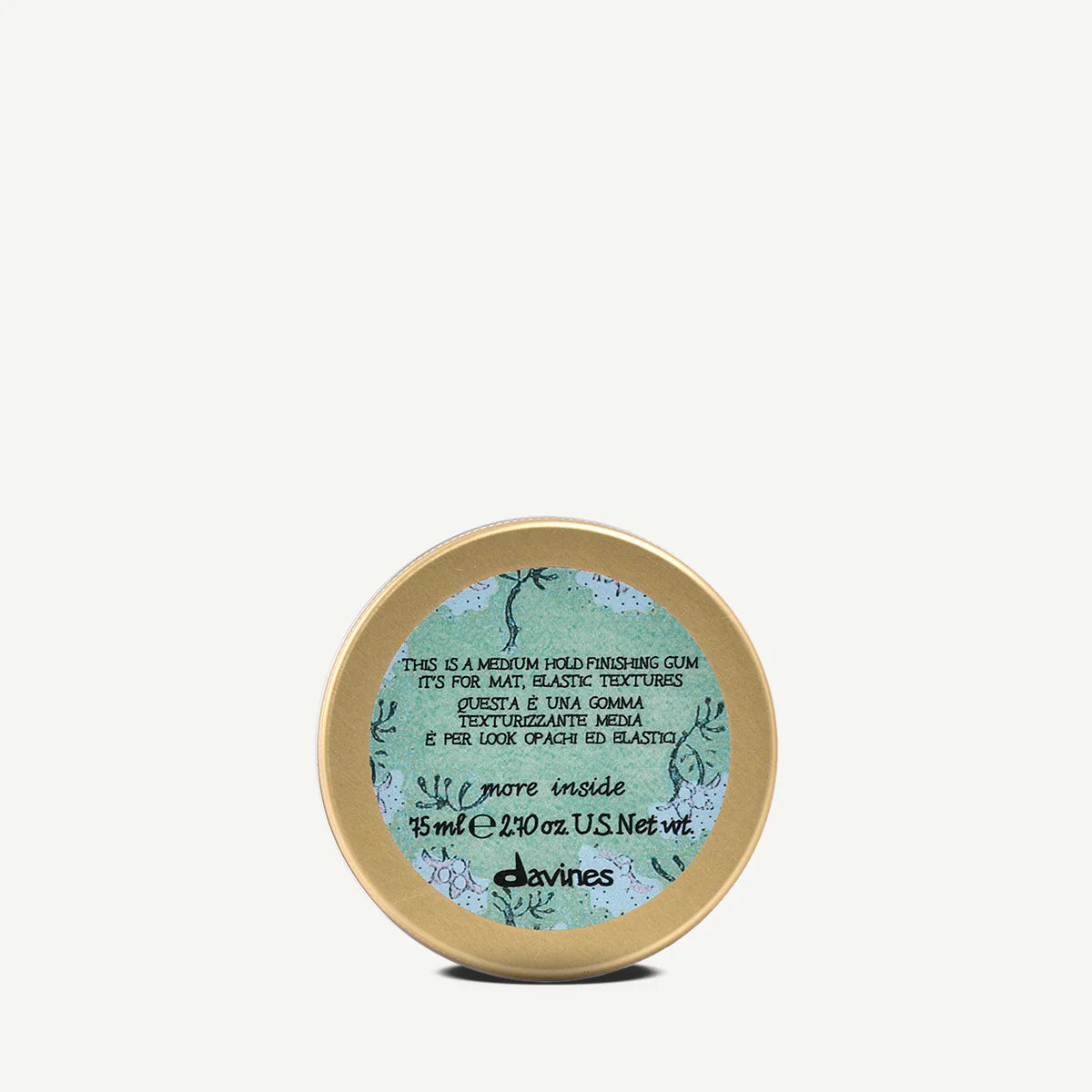 This is a Medium Hold Finishing Gum i en liten burk med gult lock, en miljövänlig stylingprodukt som ger medium stadga och elastisk textur för håret.