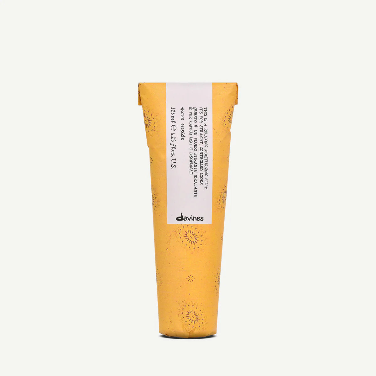 This is a Relaxing Moisturizing Fluid i en gul förpackning från Davines, en fuktgivande och avslappnande hårprodukt som är skonsam mot håret.