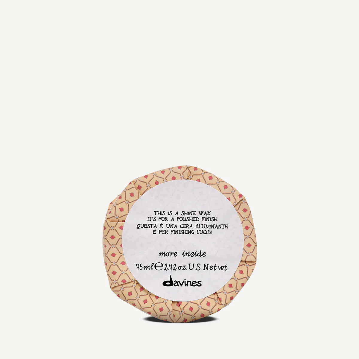 This is a Shine Wax i en liten förpackning med 75 ml stylingvax från Davines för polerad finish och glans i håret.
